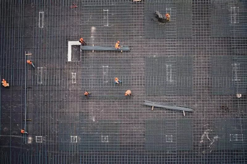 Pressed and welded grating